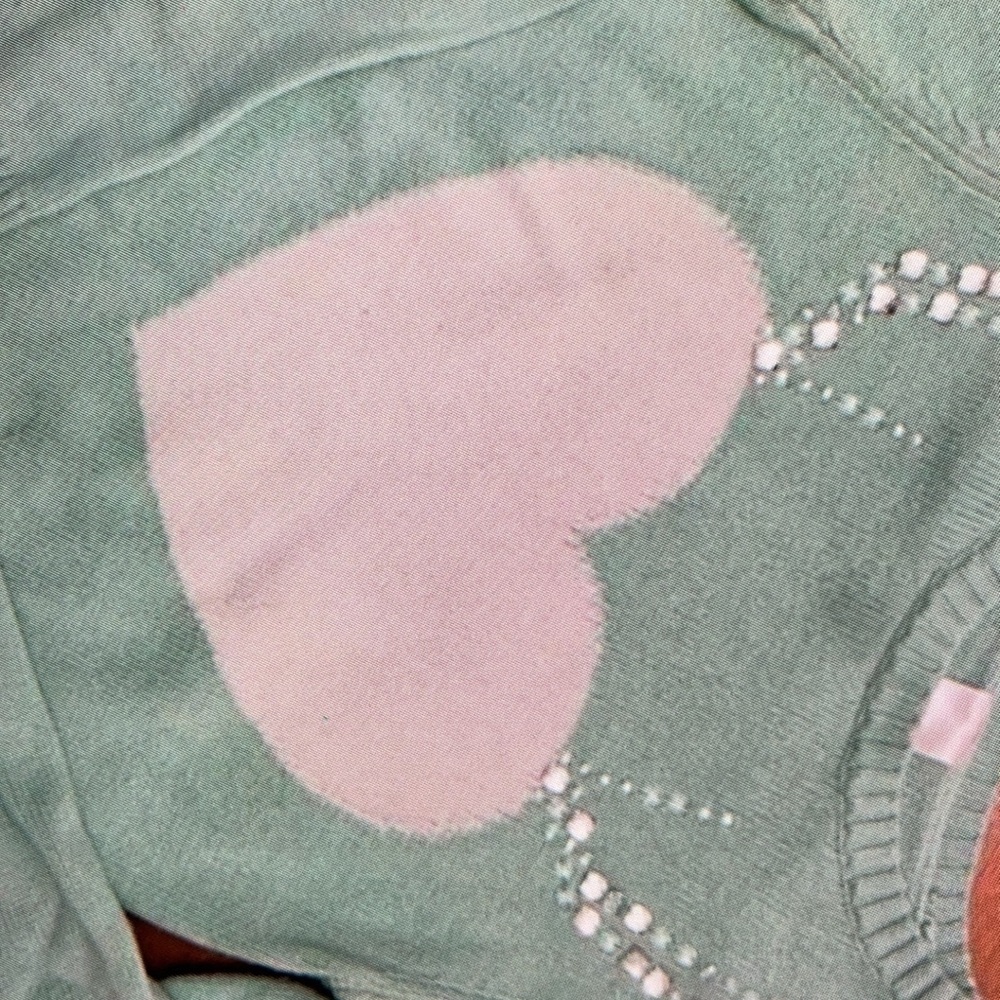 Features heart jeweled antlers and stylish blouse